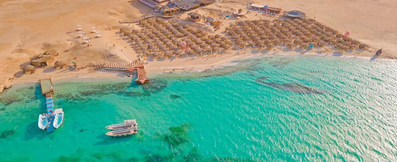 Turquoise lagoon and beach on Magawish Island near Hurghada, seen from above