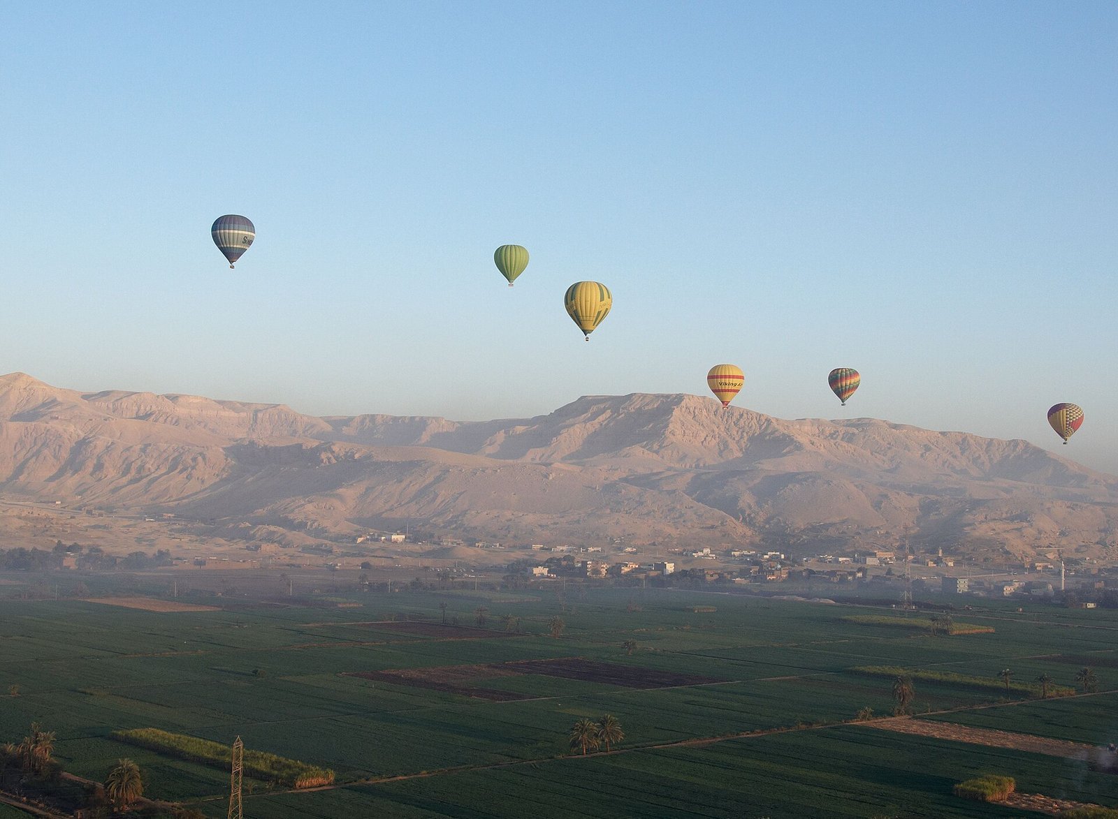 Hot air balloons over the West Bank of Luxor at sunrise